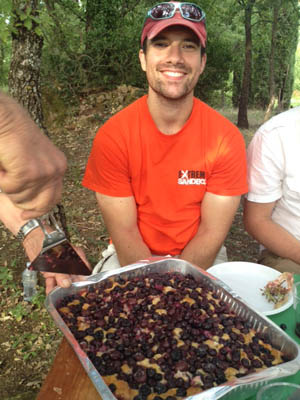Sitting in a vineyard in Greve in Chianti, enjoying wine, pecorino, salami, and schiacciata all'uva